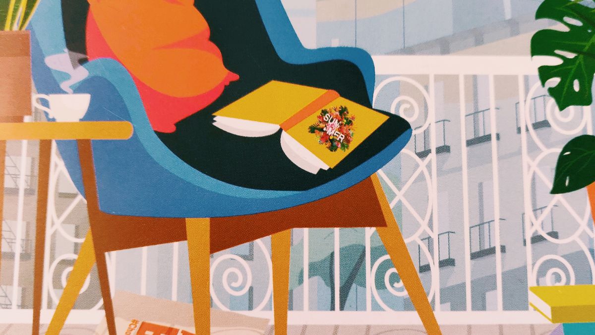 Cover Detail of the Summer Books Catalogue showing a book on a chair