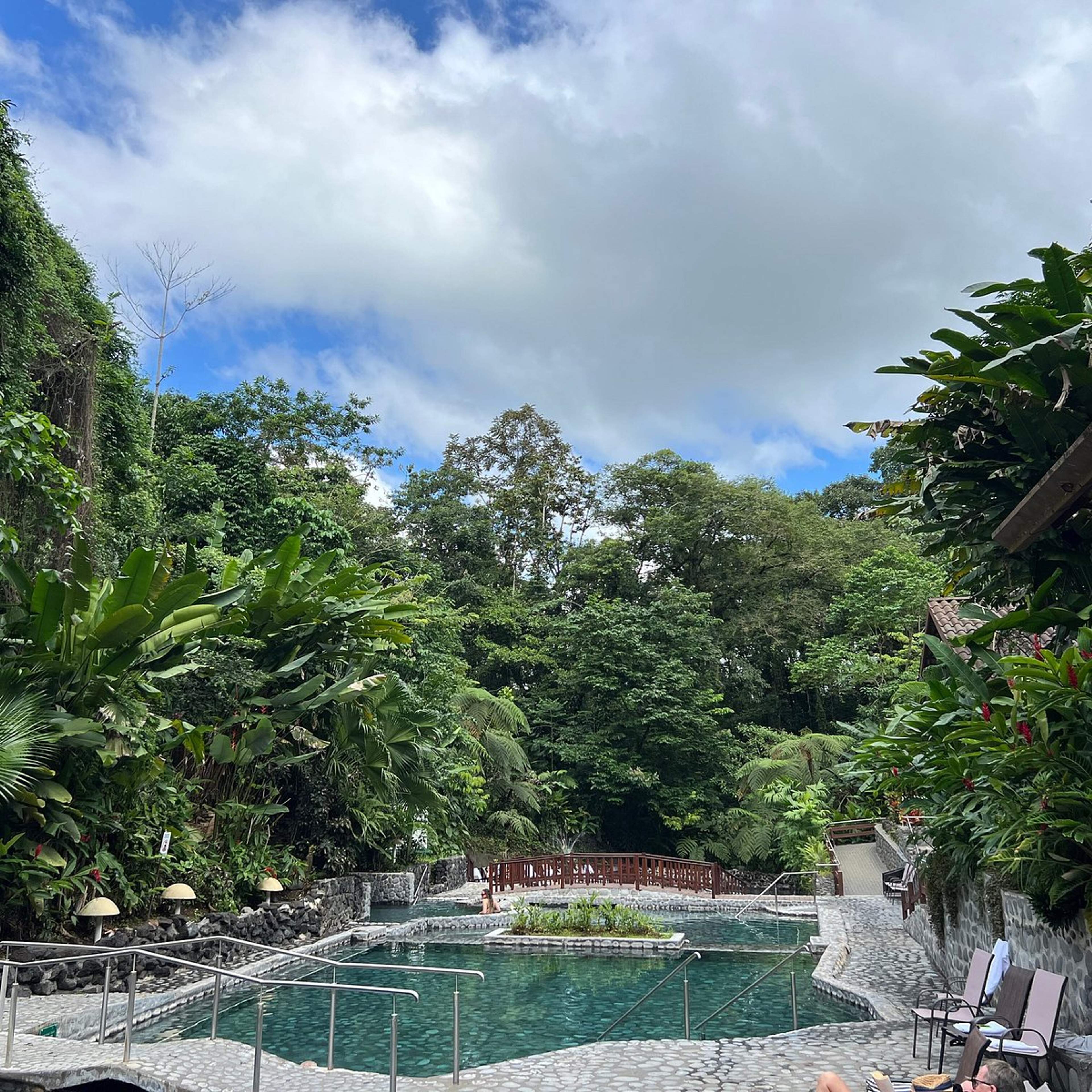 Thermal pools at EcoTermales La Fortuna, surrounded by rainforest at the foot of the volcano