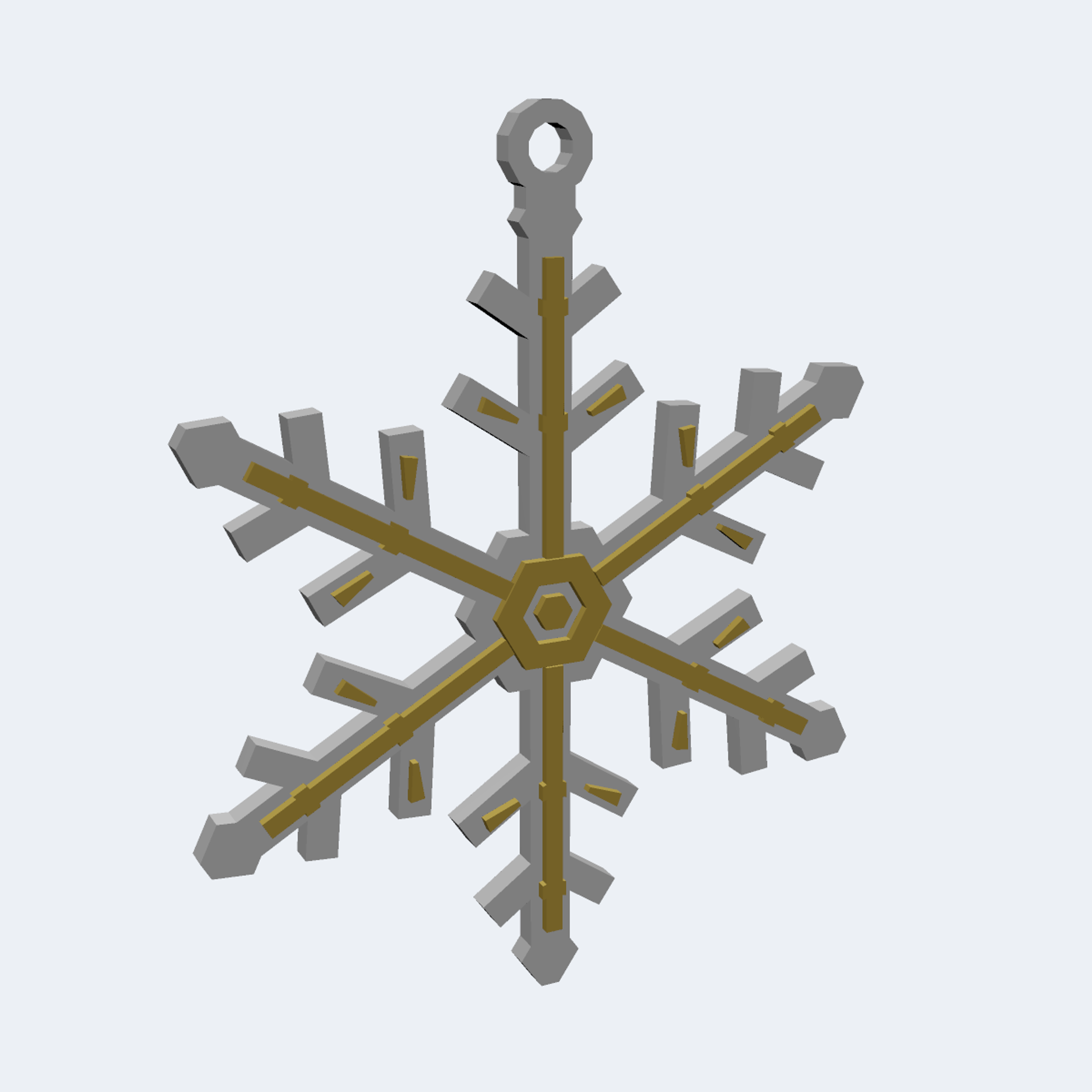 Hex Crystal Flake, a six-arm faceted snowflake ornament with a raised gold layer and a hanging loop