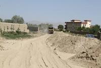 Gravel Laying Begins on Road Connecting Three Districts in Ghazni
