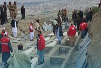 Families Search Coffins at Taliban Mass Funerals for Kabul Drug Rehab Center Airstrike Victims