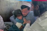 Child in Nangarhar's Behsud district cries for mother after surviving reported Pakistani airstrike