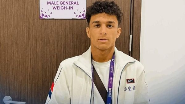 Afghan Taekwondo Athlete Mehdi Yaqoubi Defeats Armenian Opponent in Uzbekistan