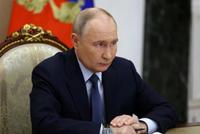 Russian President Putin signs law for unpaid leave for Afghanistan and Syria veterans