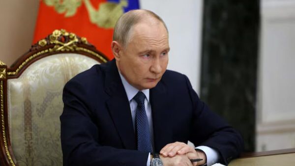 Russian President Putin signs law for unpaid leave for Afghanistan and Syria veterans