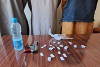 Three Detained in Ghor for Alcohol Sales and Illegal Weapons Possession