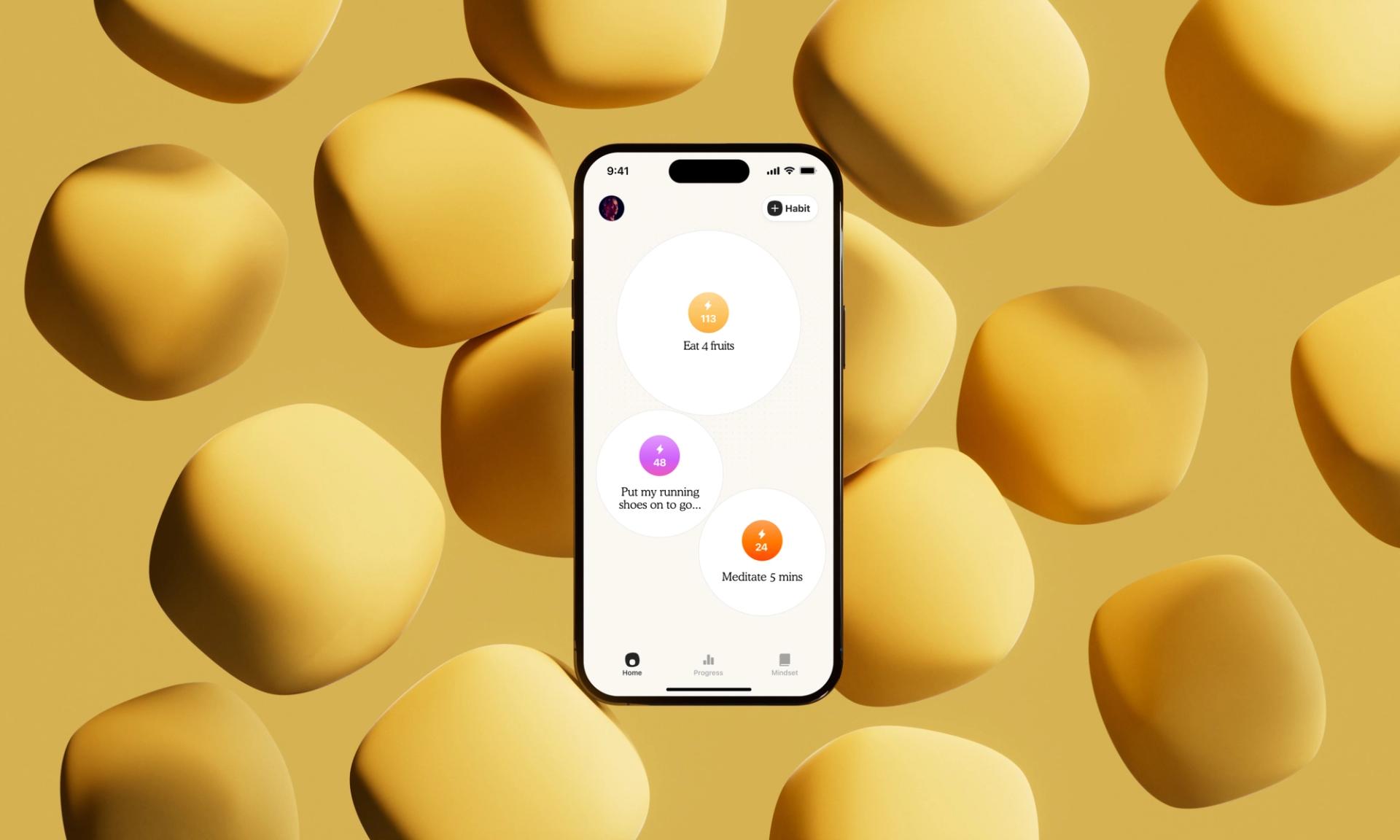 An iPhone interface laid over a yellow backdrop with yellow floating atoms. The iPhone interface has text which reads Eat 4 fruits, followed by text that reads Put my running shoes on to go..., then followed by text that reads Meditate 5 mins.