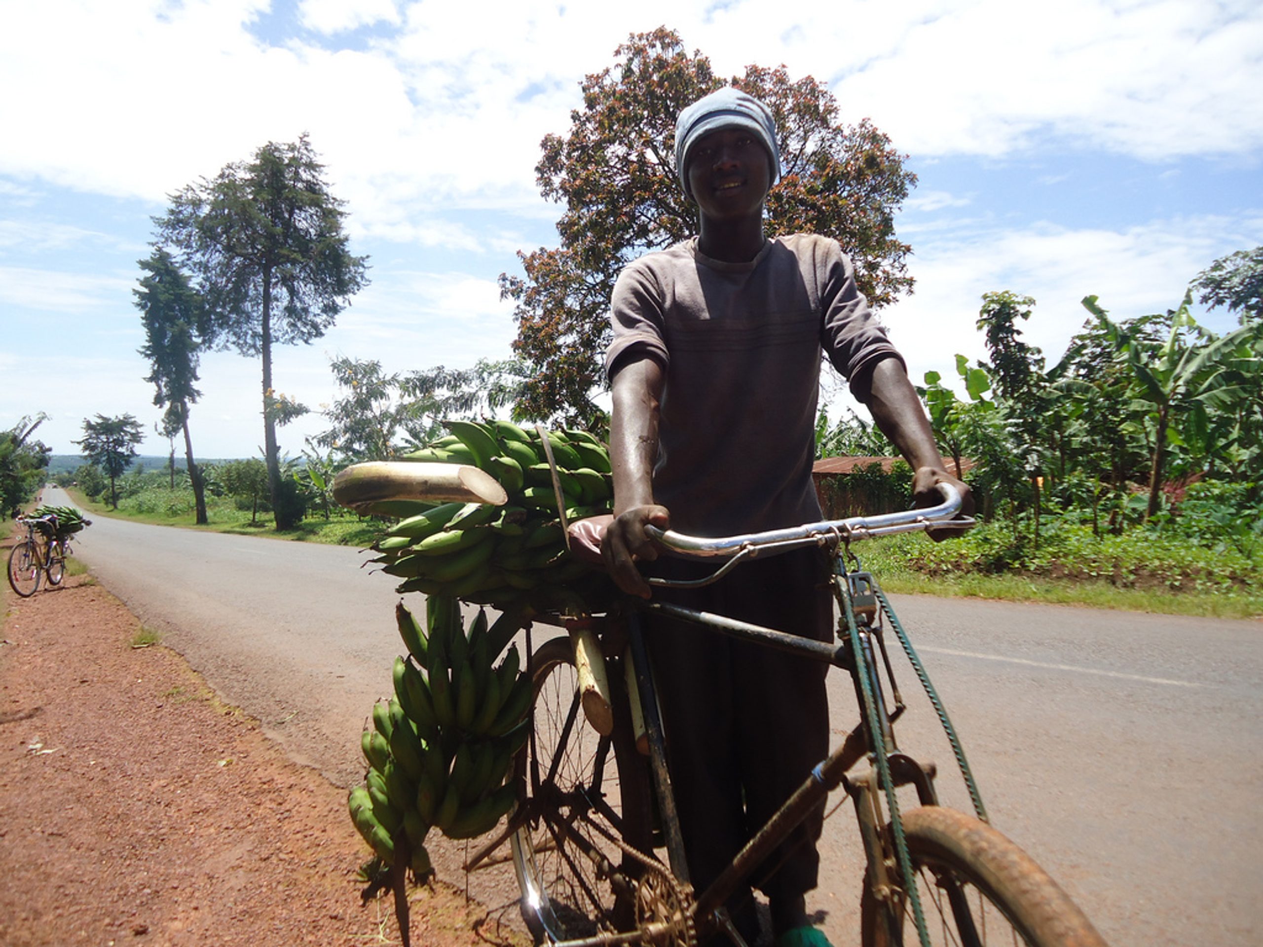 Rwanda boy on the way to market.