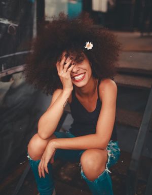 young woman being loving and kind to herself