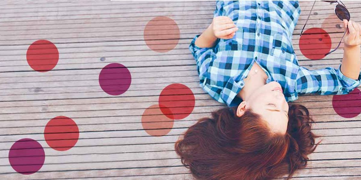 woman laying outdoors