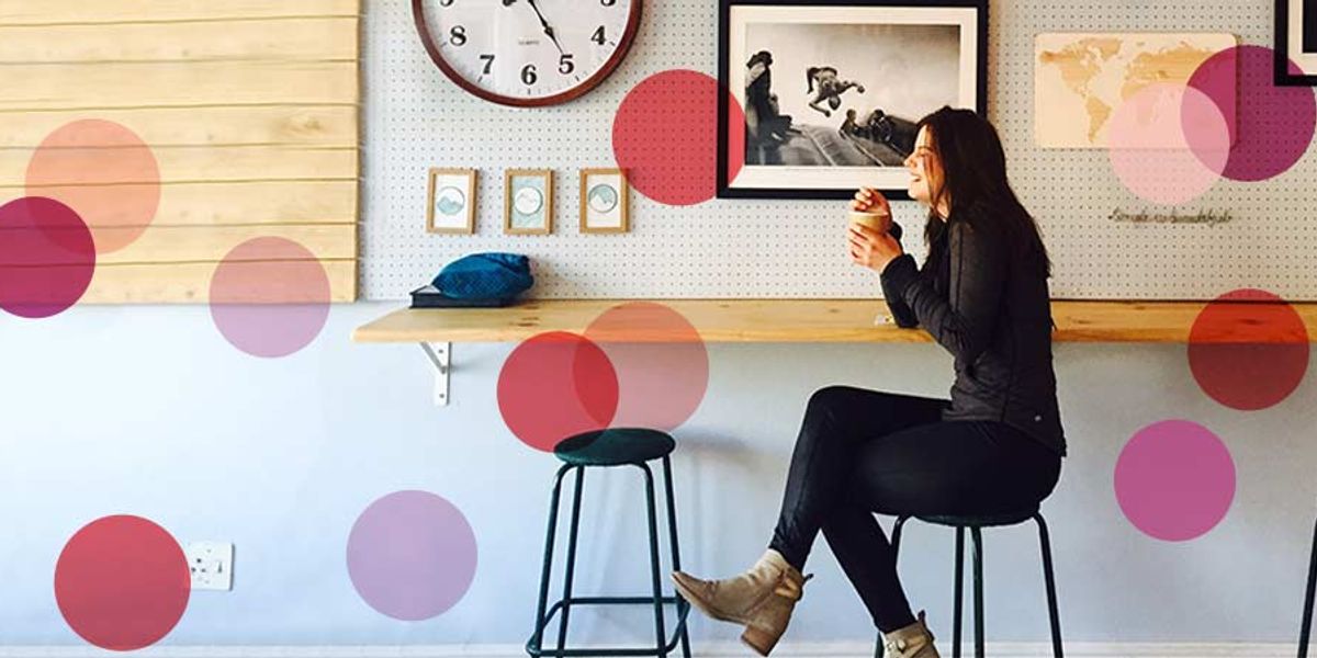 woman happy having coffee