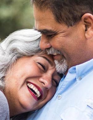 wife smiling in peace with her husband