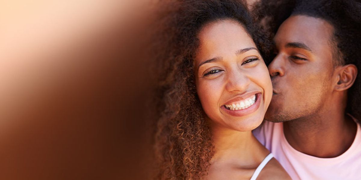 happy woman smiling and trusting her intuition