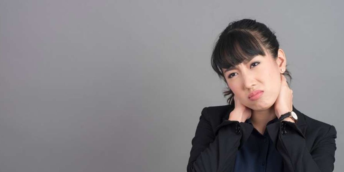 woman with neck pain dealing with stress