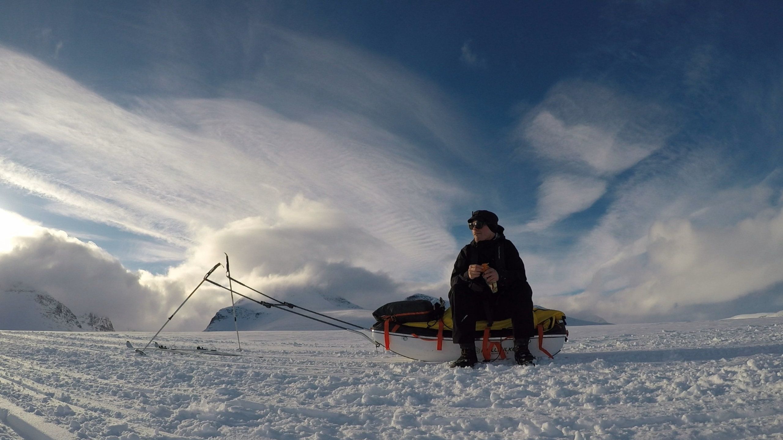 Håkan taking a rest while bckcountry skiing near sytertoppen