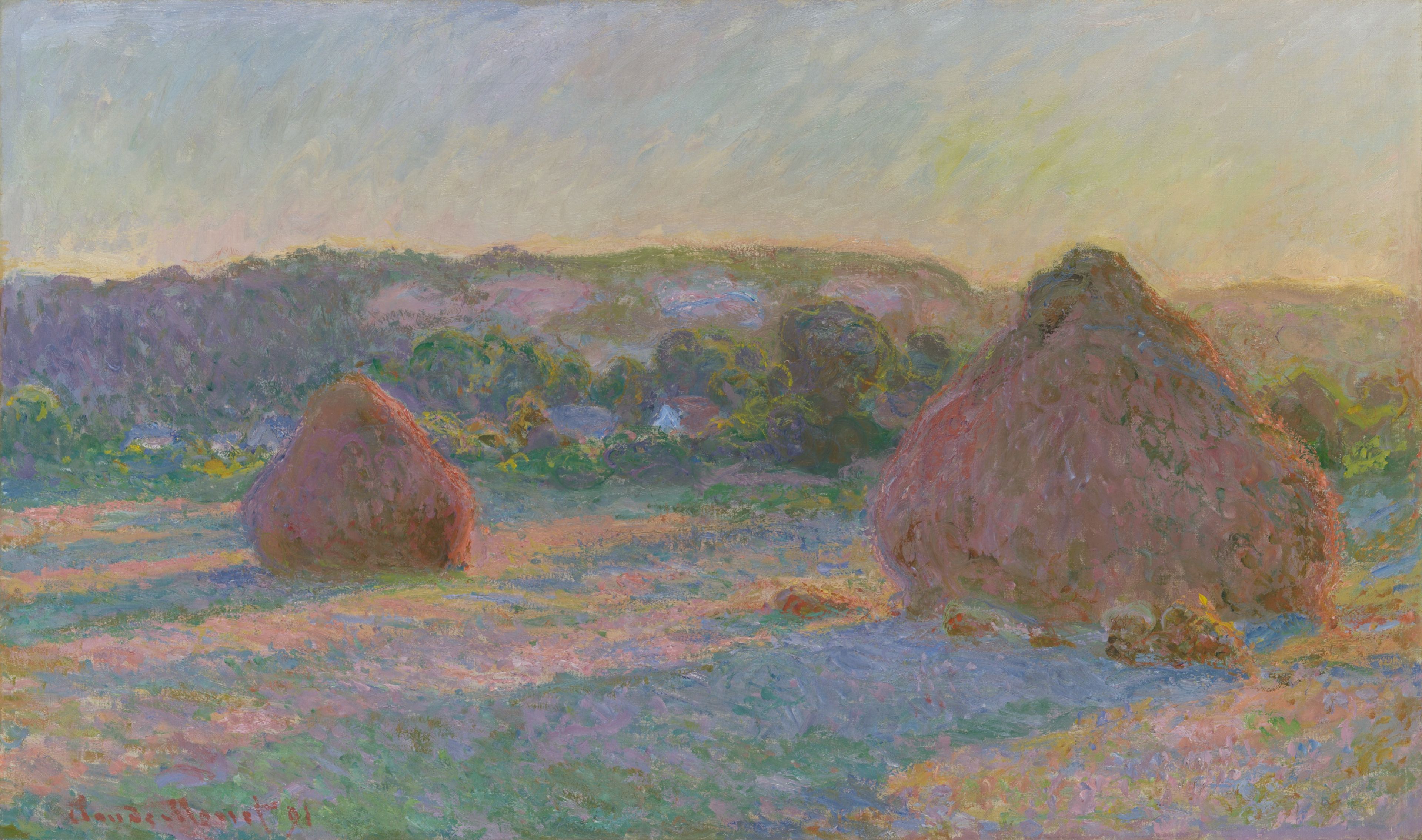 Painting composed of short, dense brushstrokes depicts two domed stacks of wheat that cast long shadows on a field. The angled light indicates either a rising or setting sun.