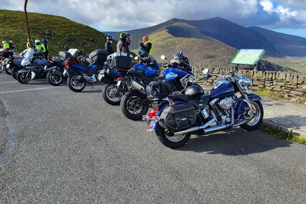 Bikes lined up at the Conor Pass viewpoint
