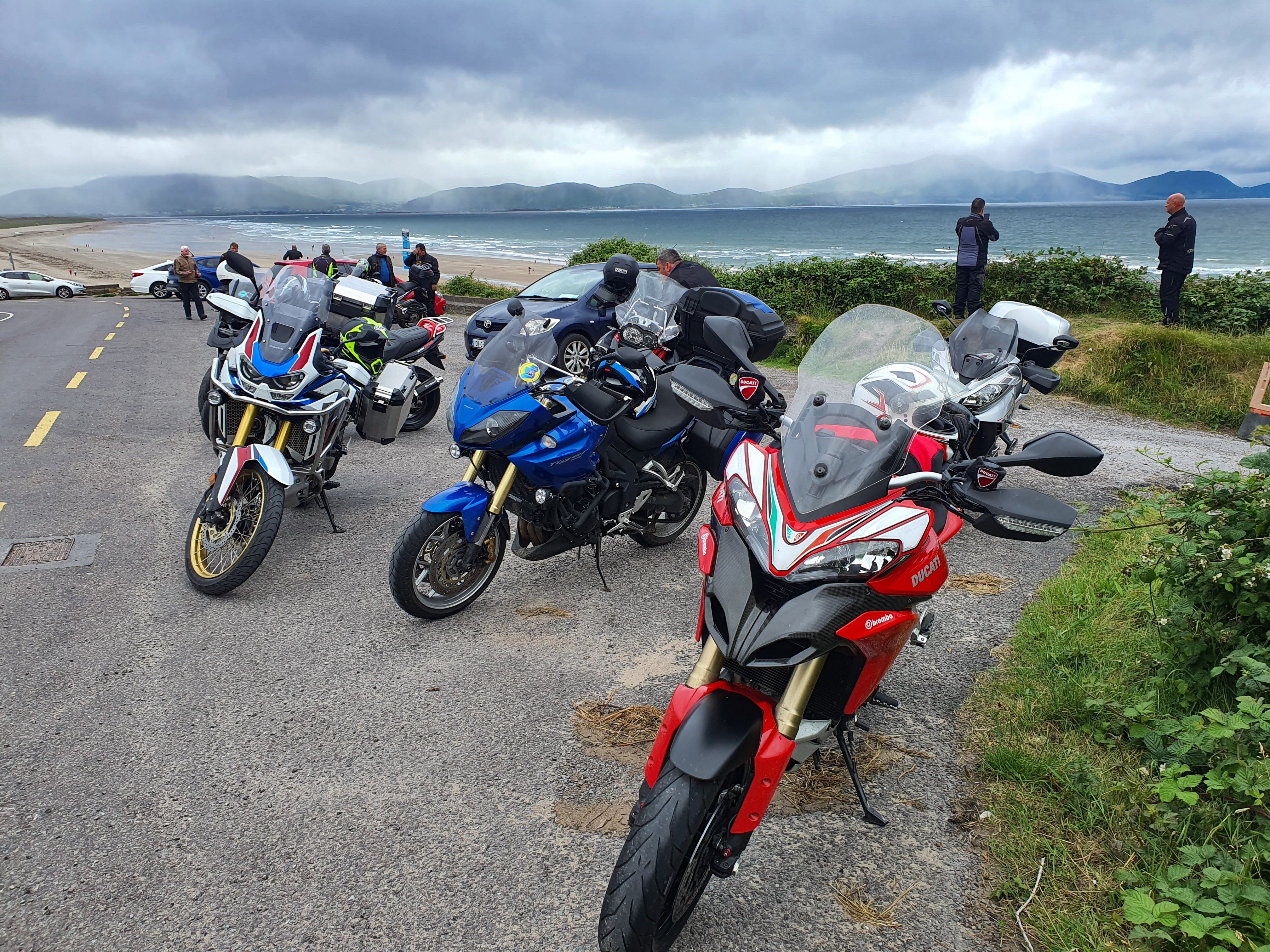 Adventure bikes parked above Inch Beach on the Dingle Peninsula