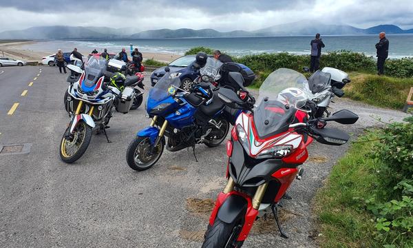 Adventure bikes parked above Inch Beach on the Dingle Peninsula