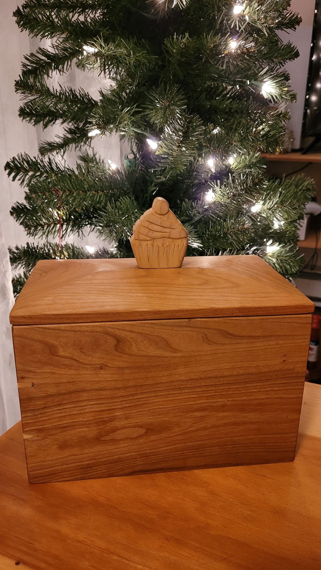 Cherry recipe box with a carved cupcake handle on the lid