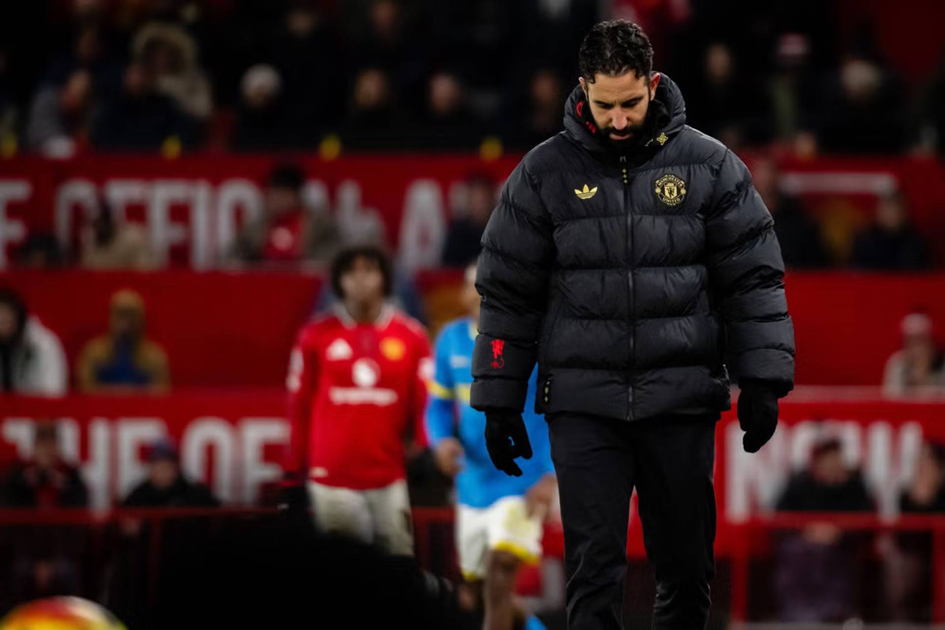 Amorim walks away from the Old Trafford pitch during the final stage of a Manchester United tenure