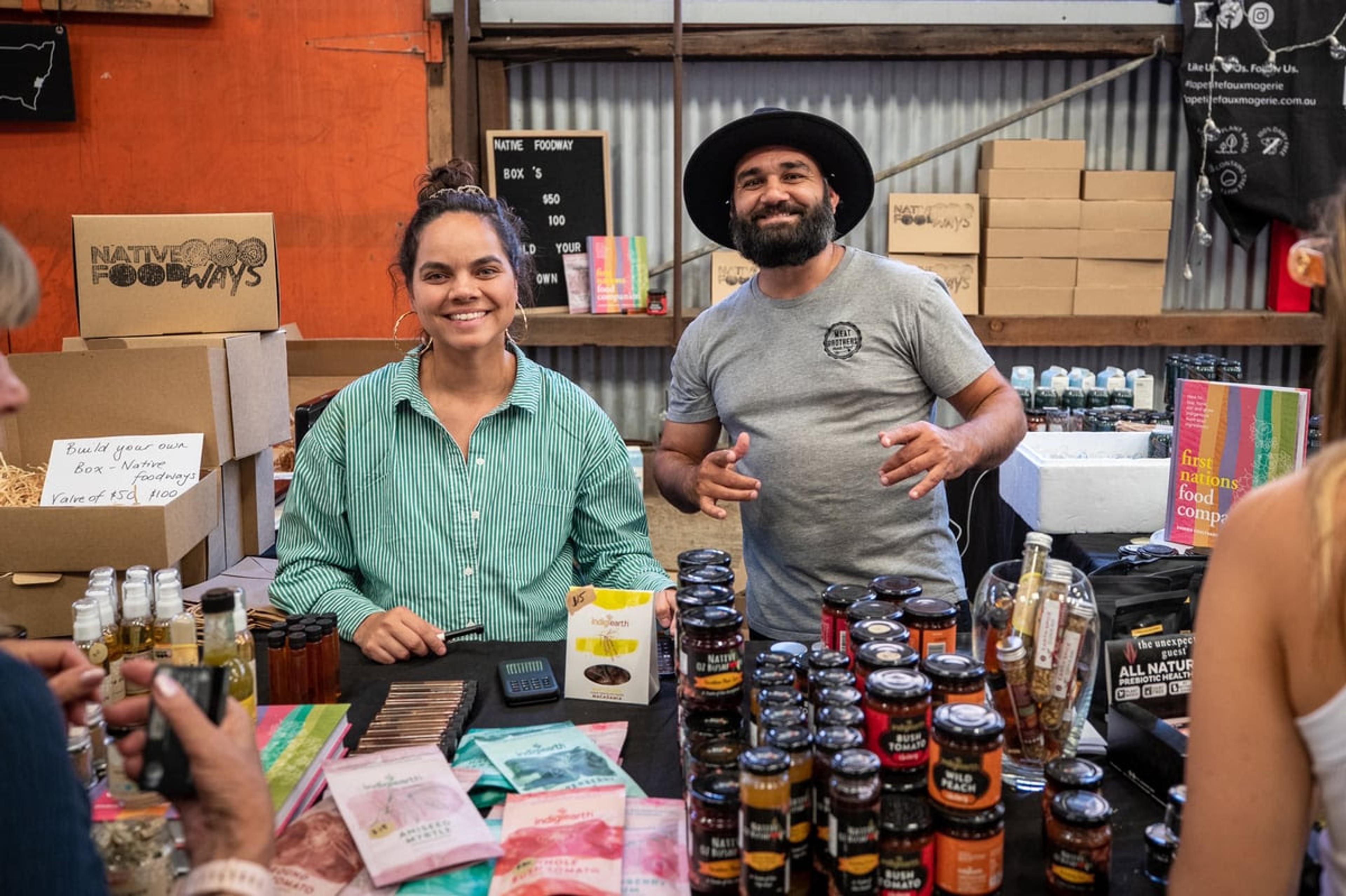Gamilaraay Man and Director of Native Foods at Native Foodways - Corey Grech with Monica Mckenzie at the Carriageworks Farmers Makets.