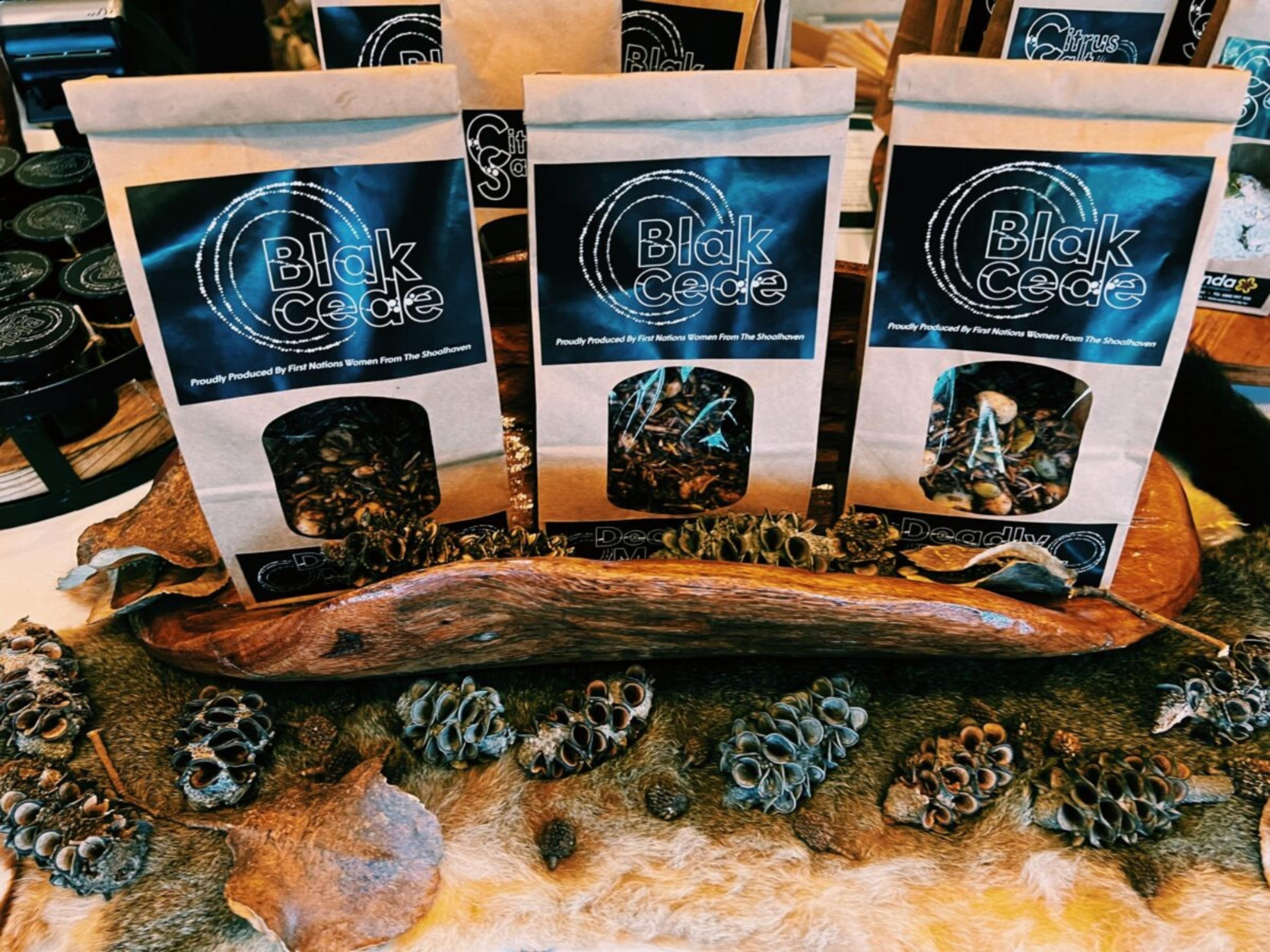 Blak Cede products sitting in a coolamon.