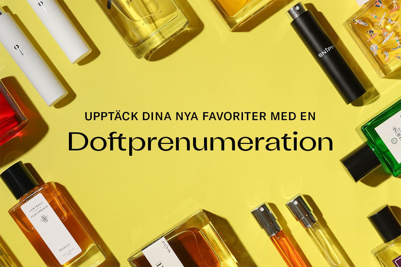 Parfymflaskor mot en gul bakgrund