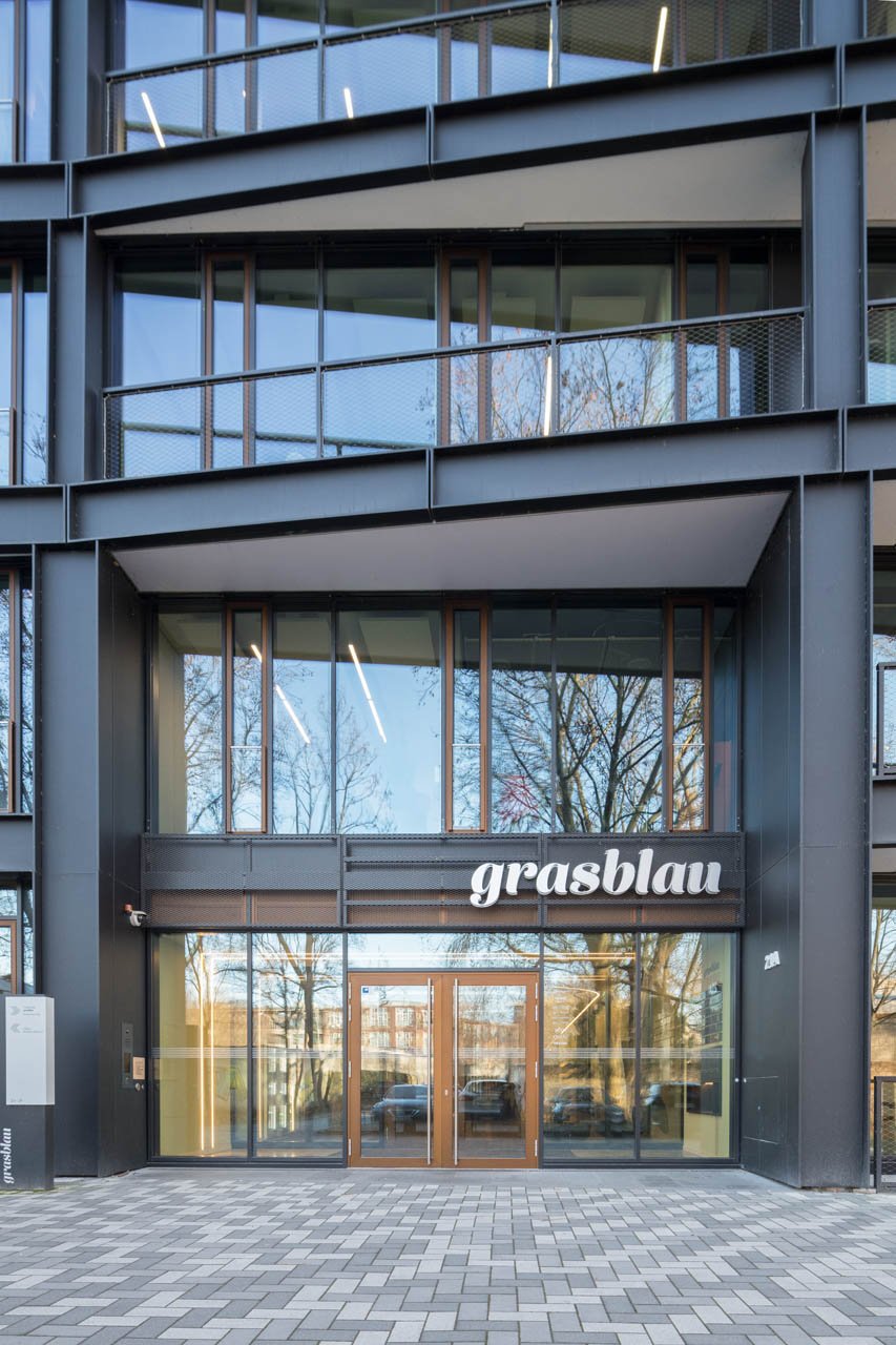 Entrance to the grass-blue office building in Berlin