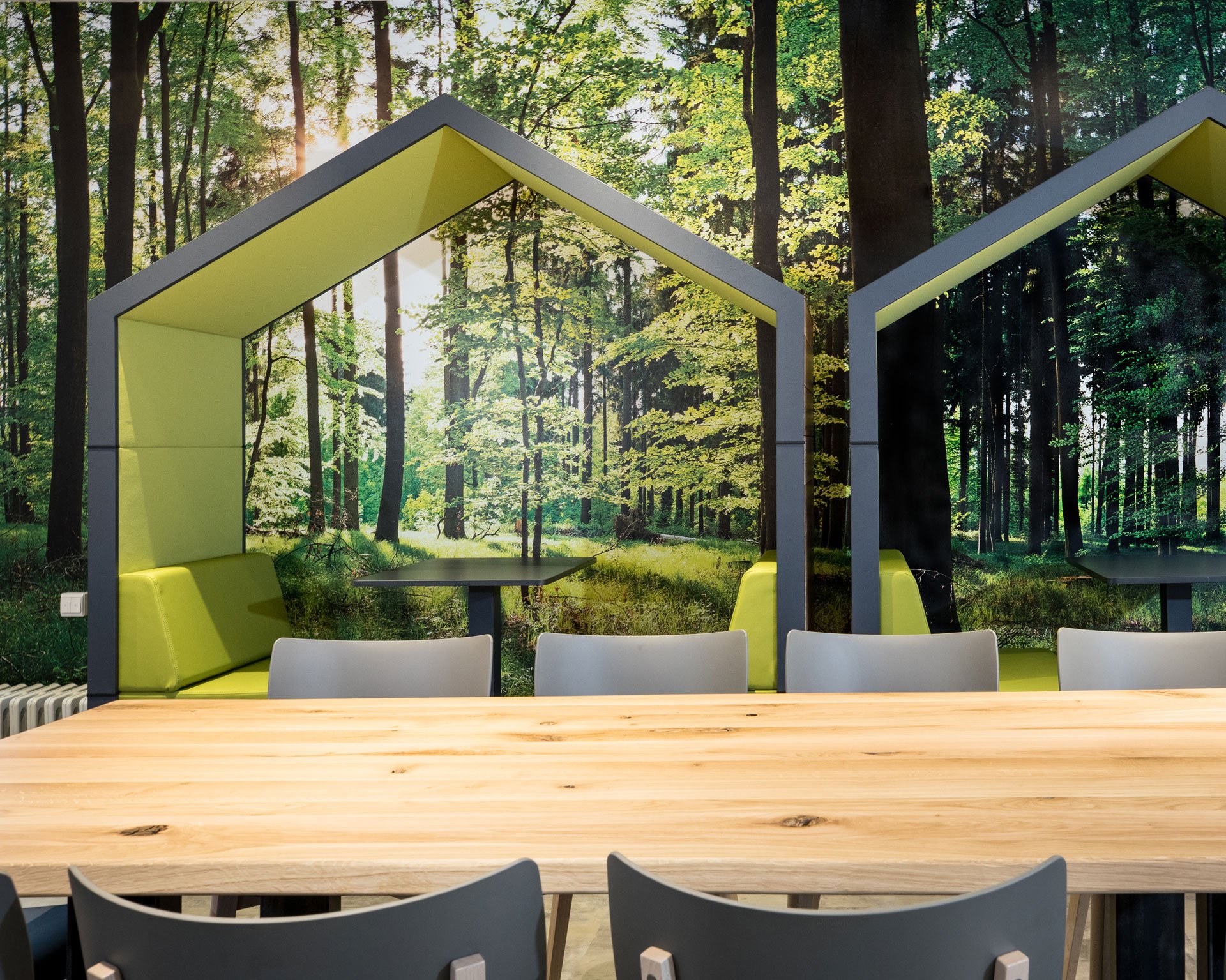 Cafeteria with green office furniture and wood look
