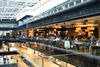 People eating at a restaurant in a shopping mall