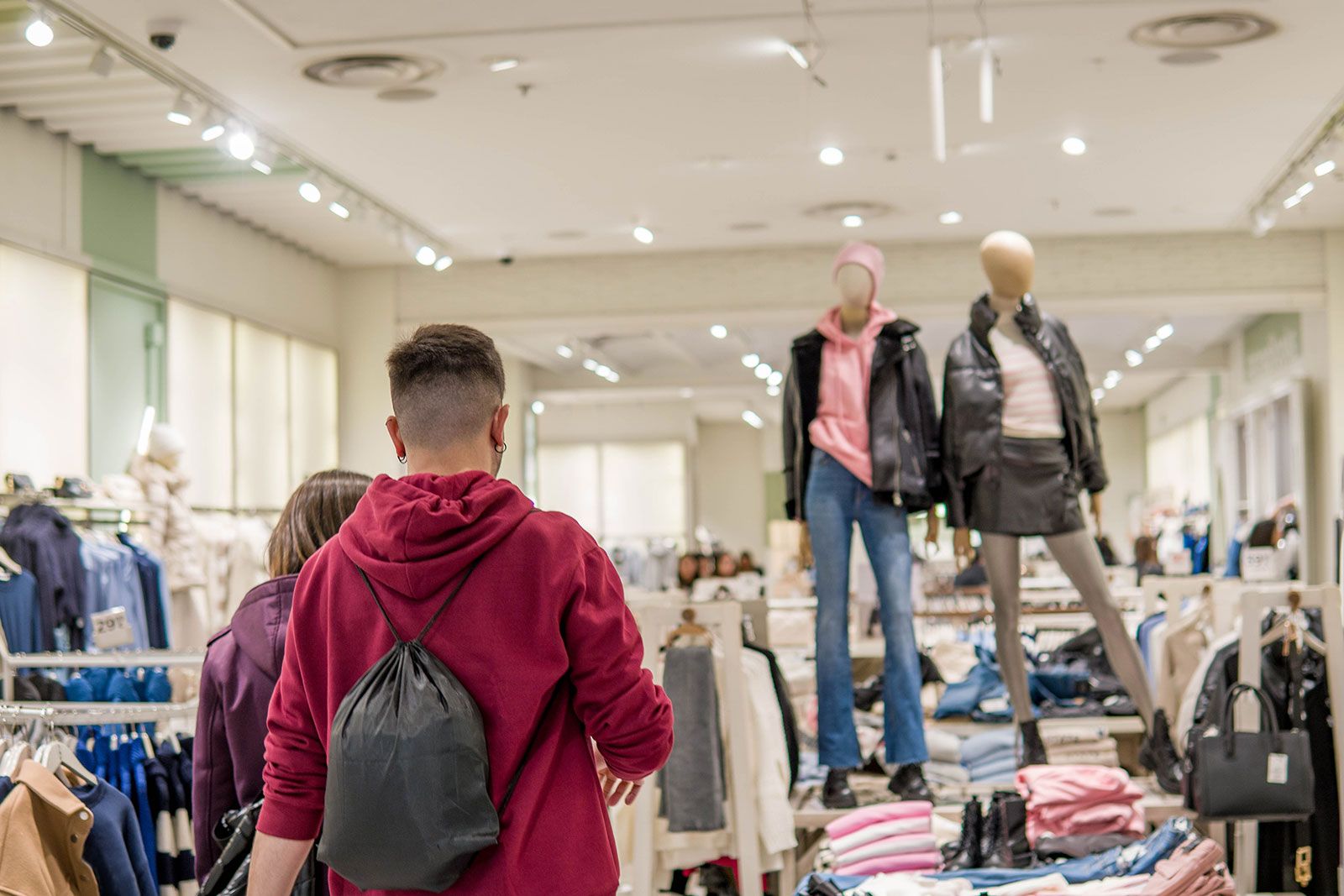 People inside a clothes store.
