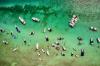 Boats gather on a sandbar in the Florida Keys.