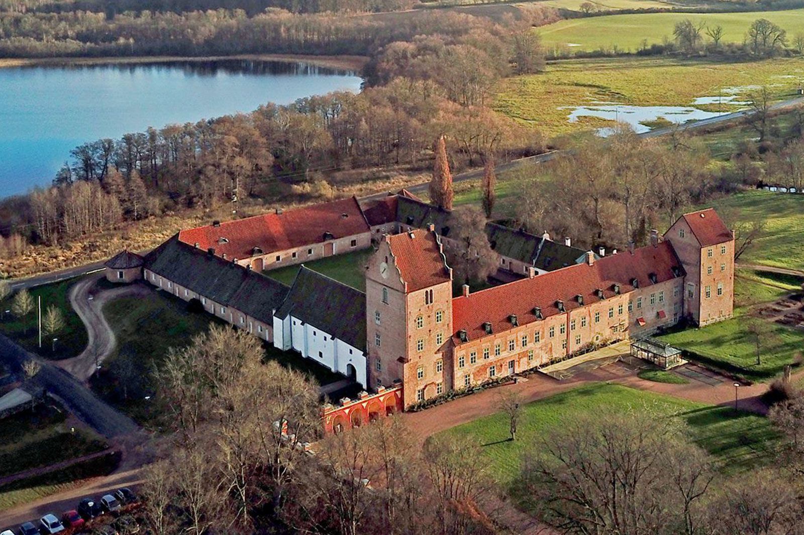 An above view of a castle hotel with nature grounds.