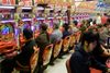 photo by <a href="https://commons.wikimedia.org/wiki/File:Pachinko_parlour.jpg" target="_blank" rel="noreferrer">MichaelMaggs</a> (<a href="https://creativecommons.org/licenses/by-sa/3.0/" target="_blank" rel="noreferrer">CC BY-SA 3.0</a>) modified