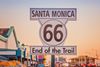 A historic route 66 sign at Santa Monica California.