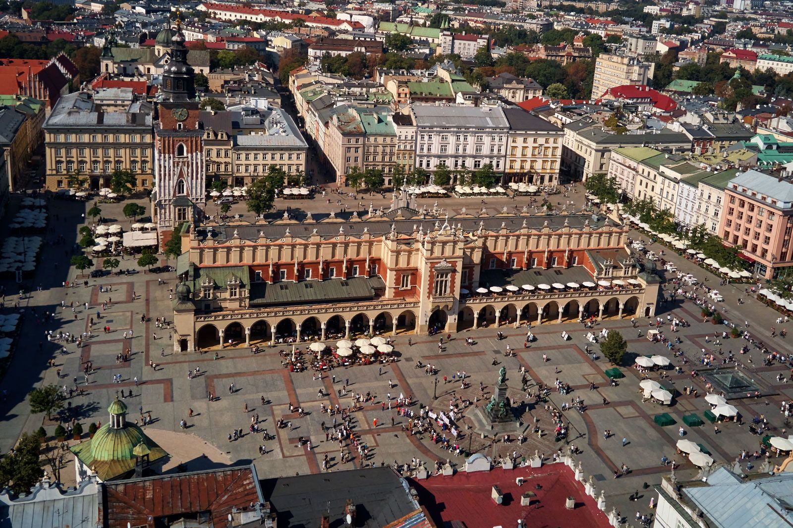 An aerial view of a main market square with historic Hall.