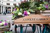 Sign for Covent Garden with flowers.