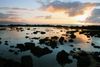 A shallow shore at sunset.