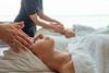 Two women getting massaged.