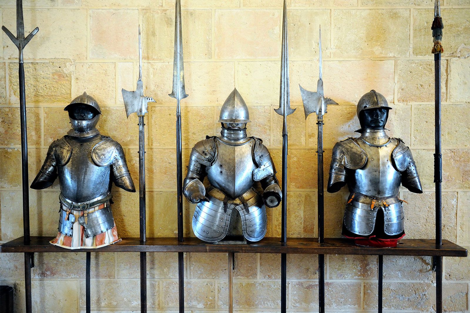 Soldiers armor with halberd kept on a table.