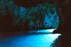 photo by <a href="https://de.wikipedia.org/wiki/Datei:The_blue_cave_on_Bi%C5%A1evo_Island,_Croatia.jpg" target="_blank" rel="noreferrer">FusTup</a> (<a href="https://creativecommons.org/licenses/by-sa/4.0/" target="_blank" rel="noreferrer">CC BY-SA 4.0</a>) modified