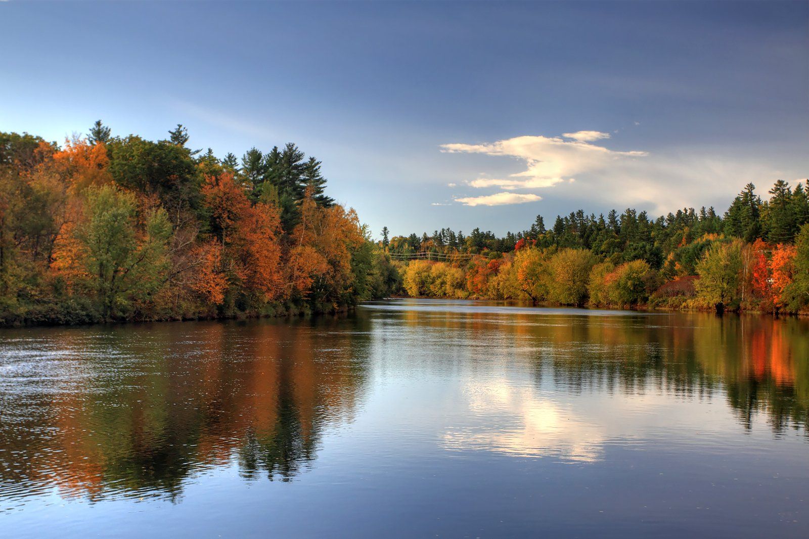 A river and colorful trees in the fall.