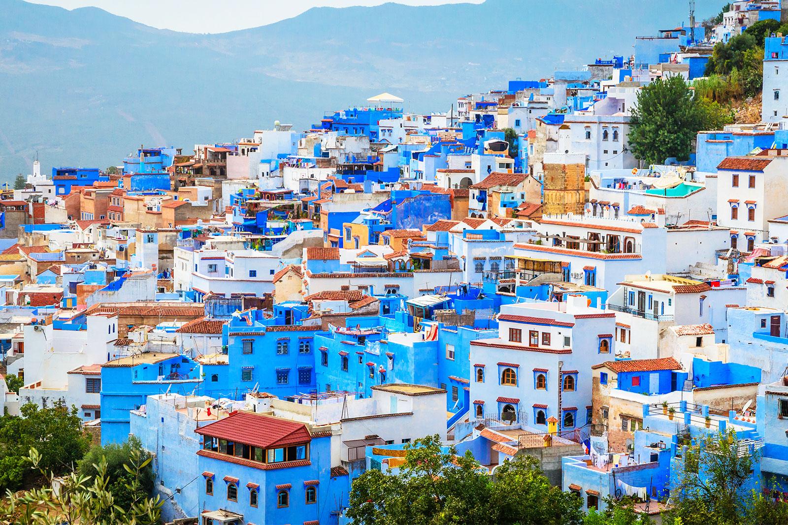 An aerial view of a blue and white city.