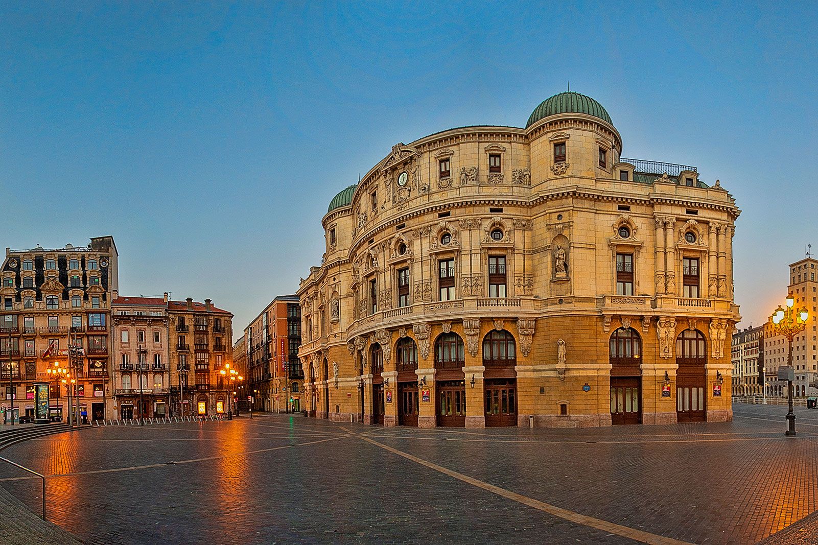 Large round theater at night.