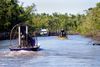 Airboats cruising through the Everglades.