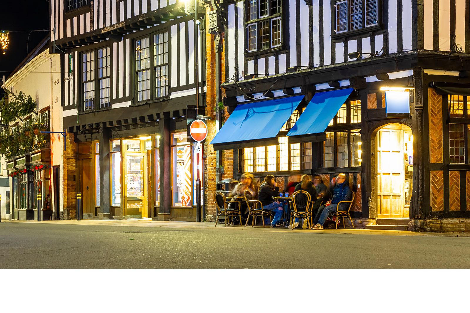 A night view of a town street.