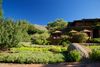 A lush green eating area on a lawn.