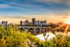 View of river, bridge, and buildings in Saskatoon.