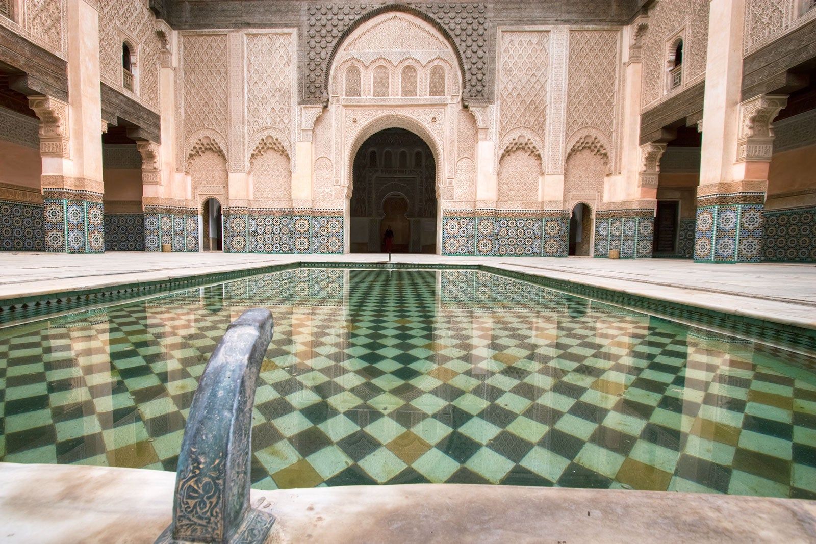 Interior of a traditionally tiled and carved hammam.